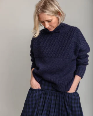 💙 The perfect navy jumper.

The Craske in certified 100% British Wool has been a best seller since 2021 and there's a reason.

I created the block from tried and tested shapes which I have honed throughout my career as a knitwear designer.

Extremely simple in shape and pattern, with a wider then expected body which is also shorter than expected to create a flattering "swing" at the hem which does not grip the hips. The hem can be partially tucked at the waist to create shape, or it looks equally good layered over shirt tails.

The funnel neck is higher than expected - because I like to see a ribbed collar peeping out from under a wool great coat!

⚓This is a modern interpretation of the traditional Norfolk Gansey jumpers, near where I grew up, because I wanted to preserve their stitches and stories before they became lost in time.

🐑 Every jumper tells a story; of the stitches and shapes, but also of the wool they are knitted from. This wool is a blend of Bluefaced Leicester and Masham fleeces which comes from certified British flocks. It is spun in Yorkshire and knitted in Nottinghamshire. From fleece to finished knit in less than 125 miles.

🧶 This is the same wool that I've been using since I founded Charl Knitwear in 2019 because it is so beautiful and versatile.

Good clothes are like good food - they don't need to be complicated, just made from the finest ingredients and crafted with care.

*  Hannah wears the new size XS/S 

With thanks to @wrightanddoyle for lending us their beautiful skirt for this shoot
Thanks always to @grahamst.fashion and @lal.moons for their stunning imagery and styling.

#charlknits #everyjumpertellsastory #britishwool #campaignforwool #sustainablefashion #britishfashion #britishbrand #indiebrand #femalefounded #autumnknitwear #sweaterweather #navyjumper #gansey #madeinbritain

 #madeinbritain🇬🇧